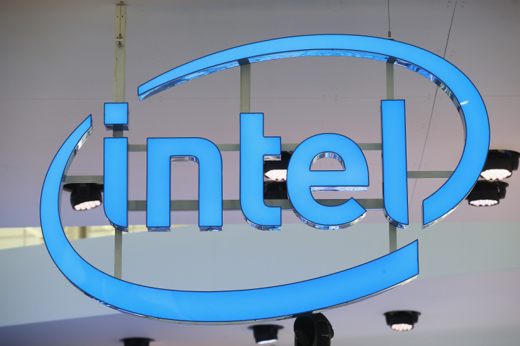 HANOVER, GERMANY - MARCH 14: The Intel logo hangs over the company's stand at the 2016 CeBIT digital technology trade fair on the fair's opening day on March 14, 2016 in Hanover, Germany. The 2016 CeBIT will run from March 14-18. (Photo by Sean Gallup/Getty Images)